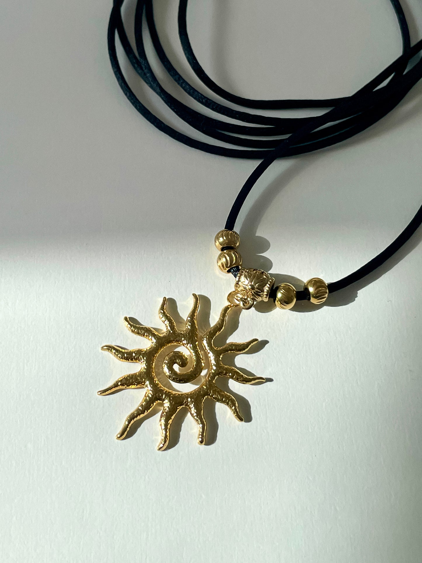 Rising Sun Necklace (black or ivory)