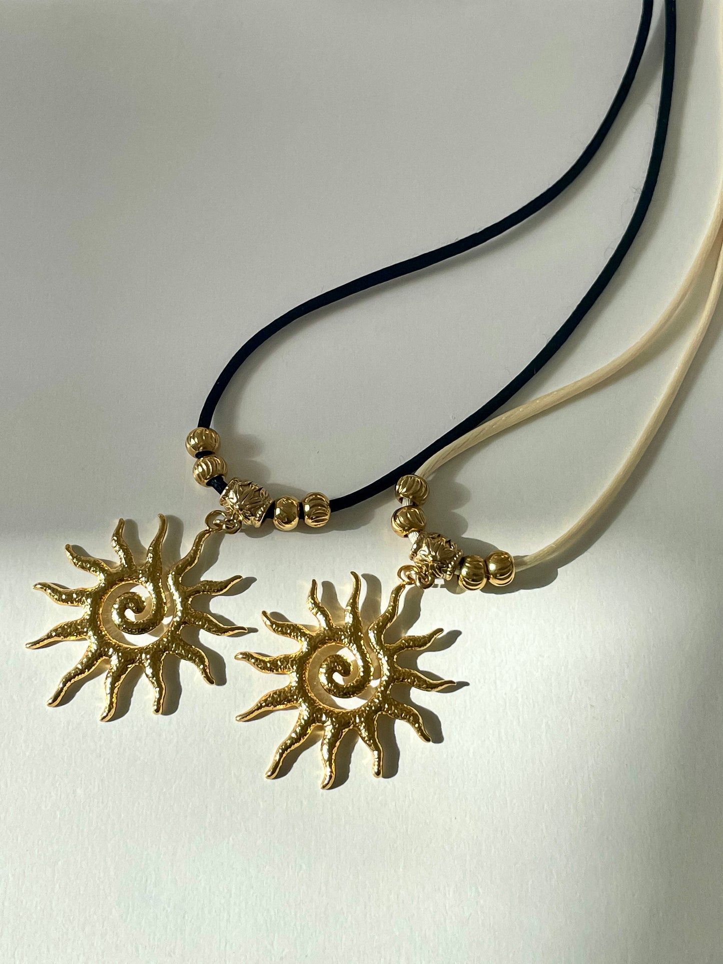 Rising Sun Necklace (black or ivory)